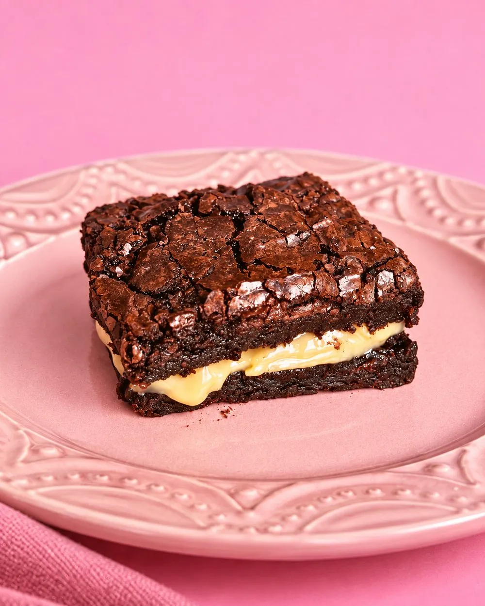 Brownie de doce de leite: Brownie de chocolate nobre com brigadeiro de doce de leite cremoso no meio